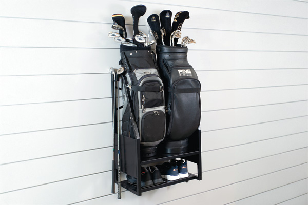 Golf Bag Organizer. GOLFBAGRK. A great solution for organizing your golf bag and clubs. This golf bag holder will securely hold two standard golf bags, along with 2 individual clubs on either side (total of 4). The convenient vented shelf can comfortably hold two pairs of golf shoes. While the middle bracket allows for the bags to be secured to the wall with adjustable straps and can hold up to 4 individual golf balls. A must have for any golfer that wants to give their golf clubs a home!